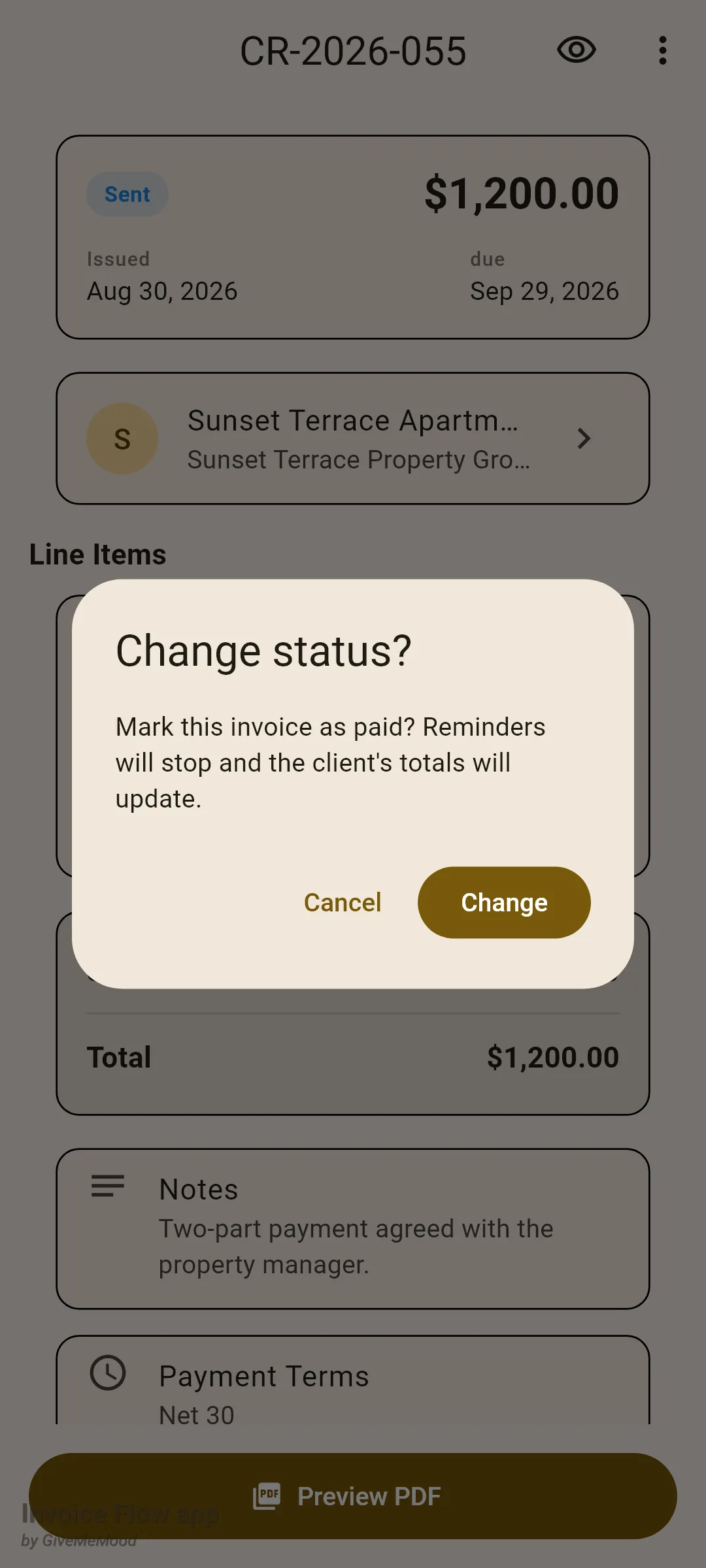 Invoice Flow app Change status? dialog over invoice CR-2026-055 reading Mark this invoice as paid? Reminders will stop and the client's totals will update, with Cancel and Change buttons